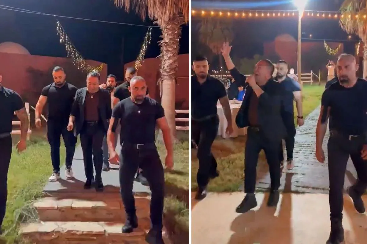 Murat Övüç'ün 4 korumayla sahneye çıktığı görüntü tartışma yarattı